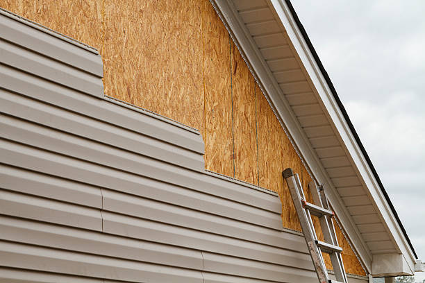Professional Siding Contractor technician working in Chester, NY